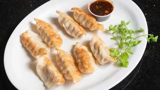 Prok Dumpling (Steamed or Fried) 8pc