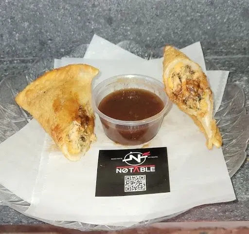 Jerk Salmon Empanada