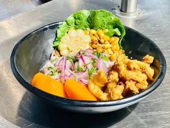 Ceviche de Barrio with fried calamari strings