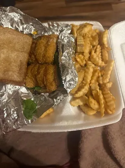 Cajun Fried Fish Sandwich  mayo lettuce served with fries