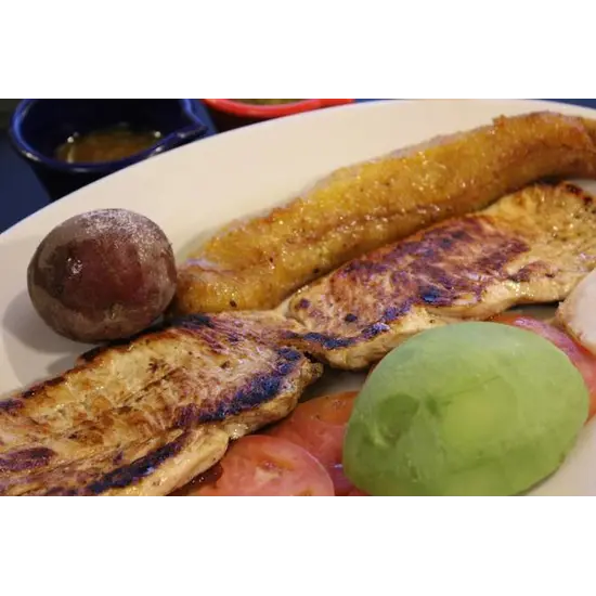 Grilled Chicken Breast (10oz) from Mondongo's Restaurante