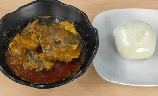 Banga soup with poundo and fresh cat fish