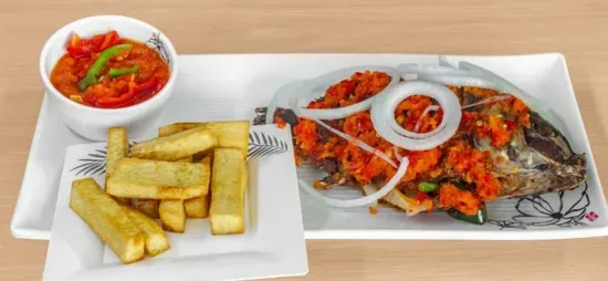 Whole Tilapia or croaker Peppered Fish with fried yam or French fries or plantains 