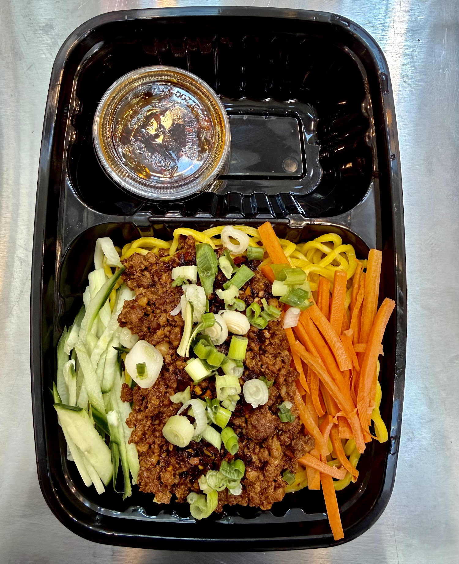 Dan dan noodles with cucumber, carrot and ground pork