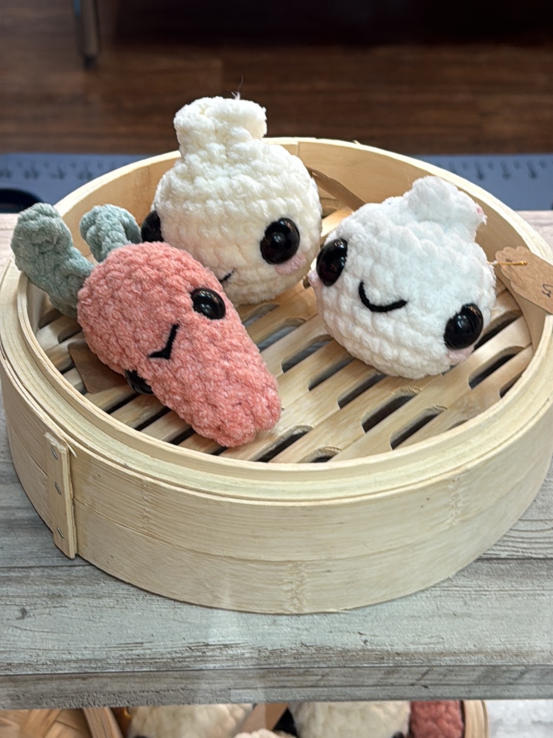 Bao plushies in a bamboo steamer