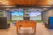 Tee Box Golf Simulators & Lounge