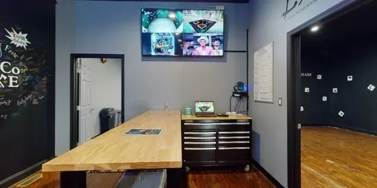 DoCo Axe Co. - Axe Throwing, VR Escape Room Adventures, Golf Simulator, Smokeless Gun Range