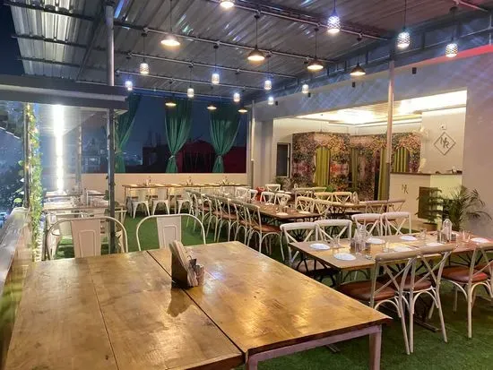 Madhuram Restaurant - Rooftop Restaurant and Cafe